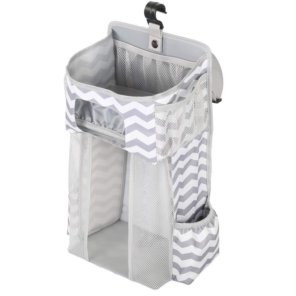Sac de rangement pour biberons et couches suspendu au lit de bébé