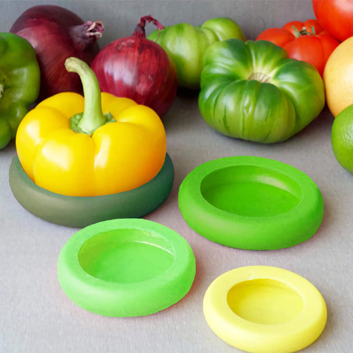 Set of 4 Reusable Silicone Food Savers for Fruits and Vegetables - Food Freshness Protector- BPA-Free Food Grade Silicone Stretch Covers - Easy To Use And Clean - Dishwasher And Freezer Safe