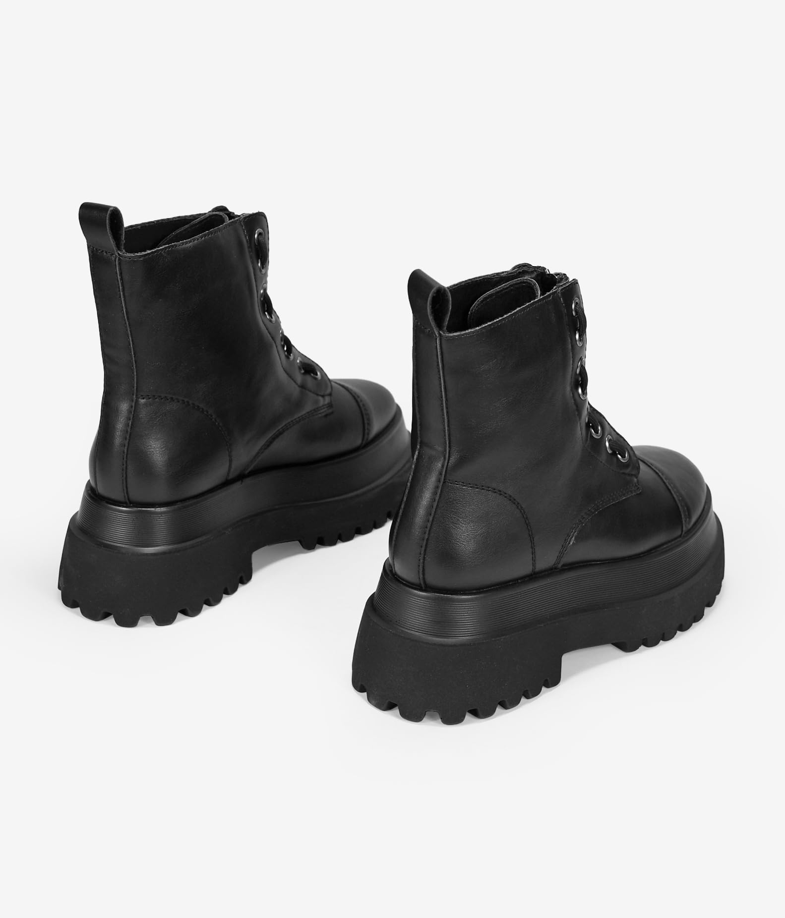 BOSANOVA Bottes militaires noires avec fermeture éclair centrale, détail de lacets et semelle plate-forme track.