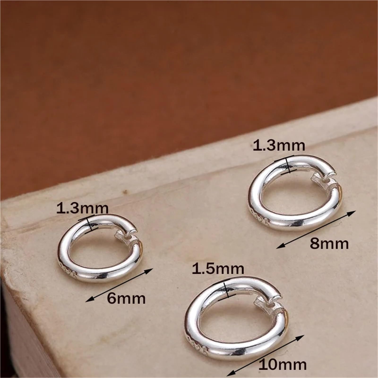 Geschlossene Biegeringe 12 Stück, silberfarbene Biegeringe mit Verriegelung für Schmuck (10 mm)