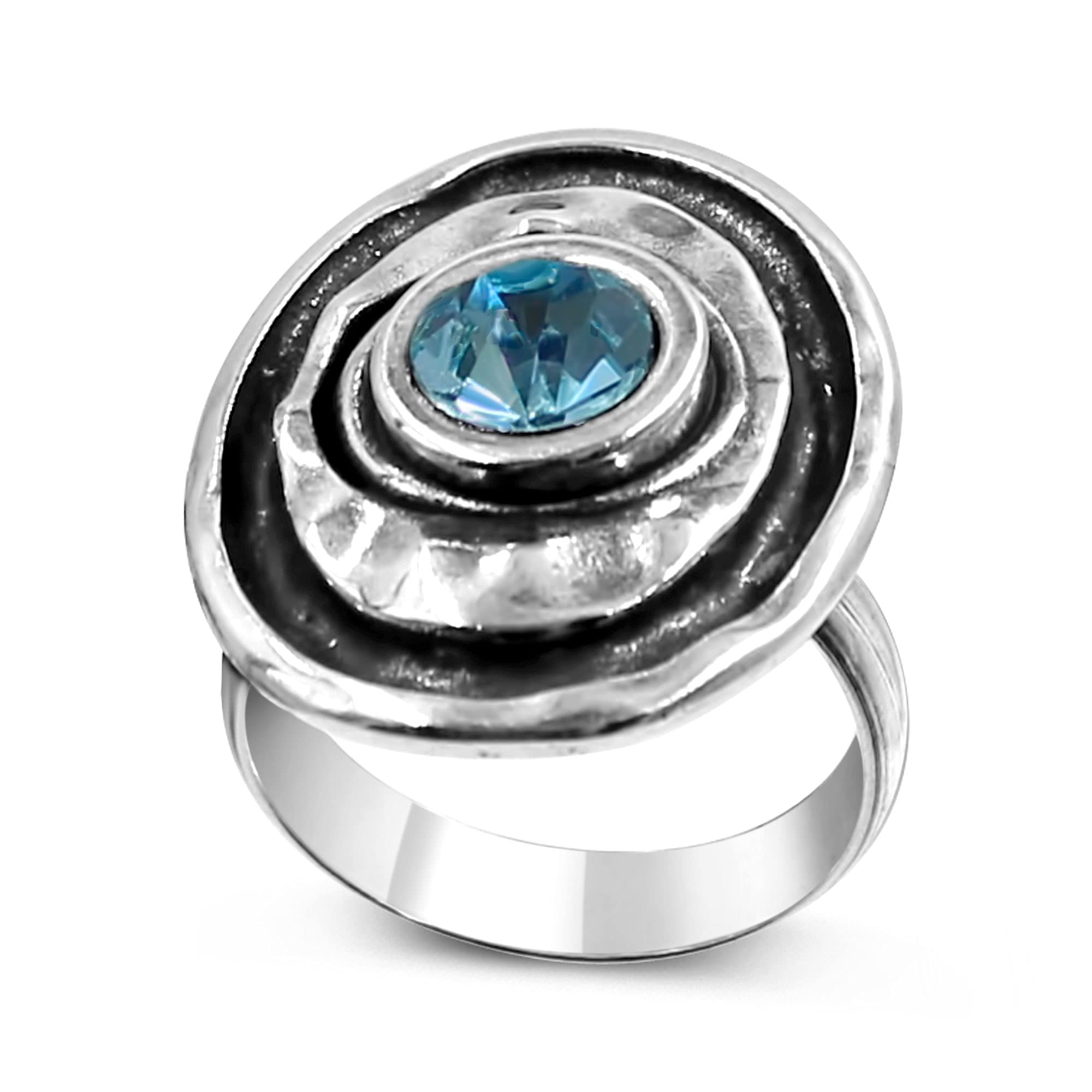 PassoAnillo ajustable mujer en plata con piedra tallada en el centro en color Aguamarina. El anillo Waena se adapta desde la talla 12 a la 19 aproximadamente. Se entrega con una caja de regalo