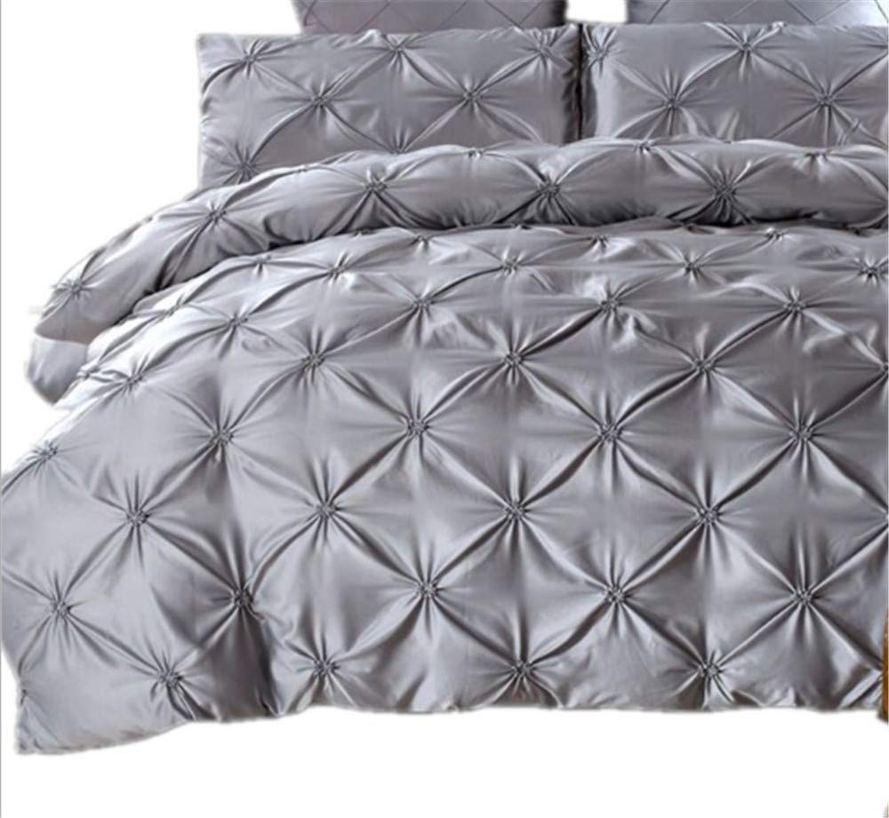 Couette d'impression et draps quatre pièces pour une chambre parentale moderne et chaleureuse