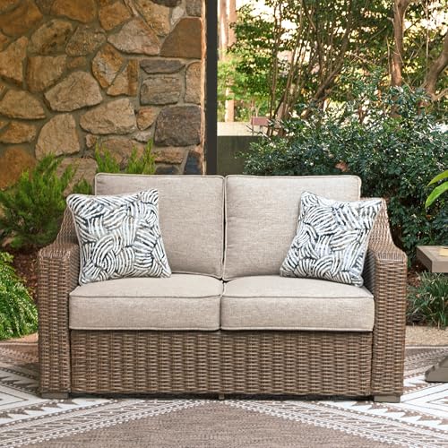 Image of Signature Design by Ashley Carmel Bay Outdoor Loveseat with Cushion, Beige | All-weather resin wicker over rust-resistant aluminum frame, Roomy 60-inch seating, Fade-resistant cushions