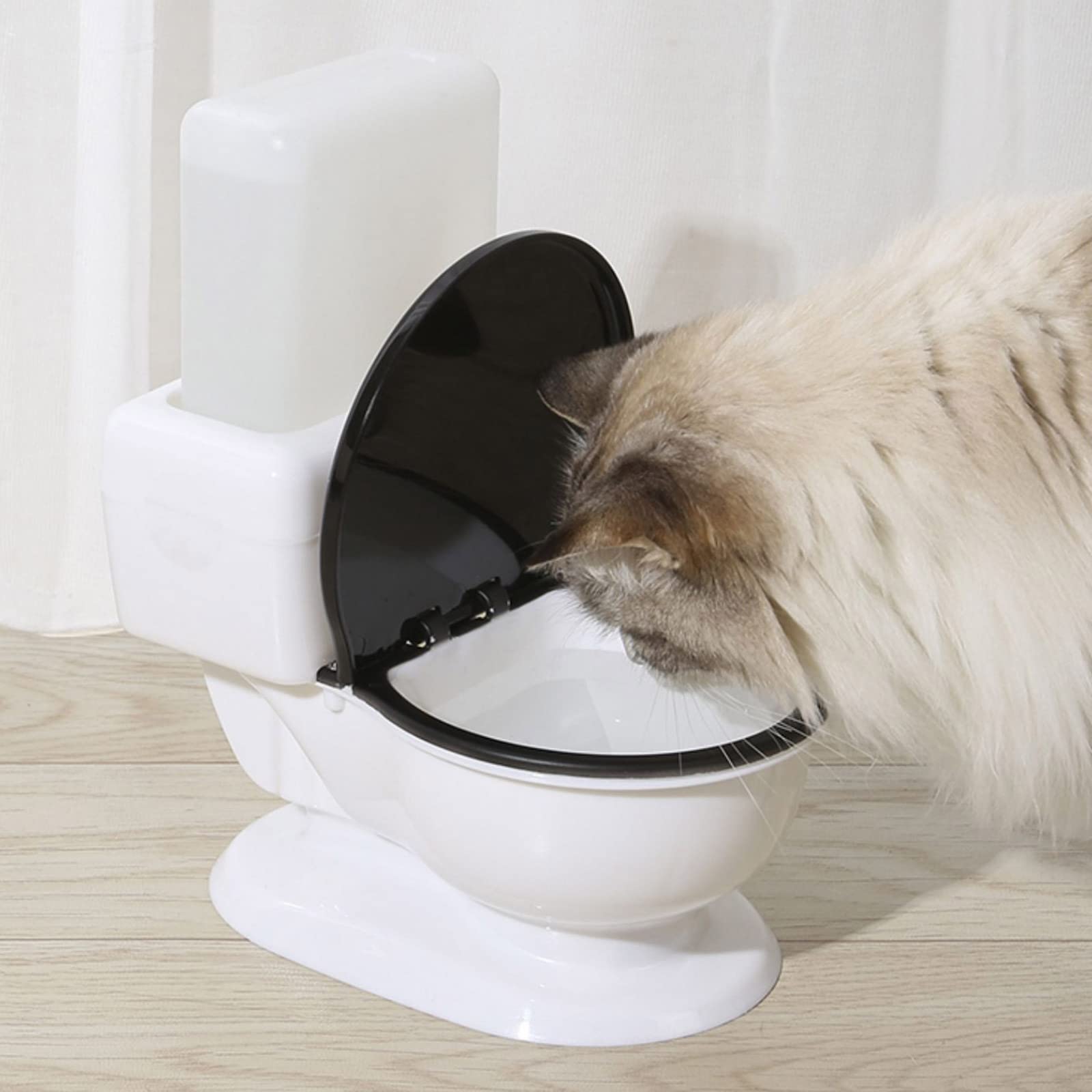 Fuente de Agua para Gatos Forma de Inodoro Divertida Bebedero automático para Mascotas Dispensador de Agua silencioso Alimentado por Gravedad 650 ml Sin Filtro para Gatos Bebedero Dispensador