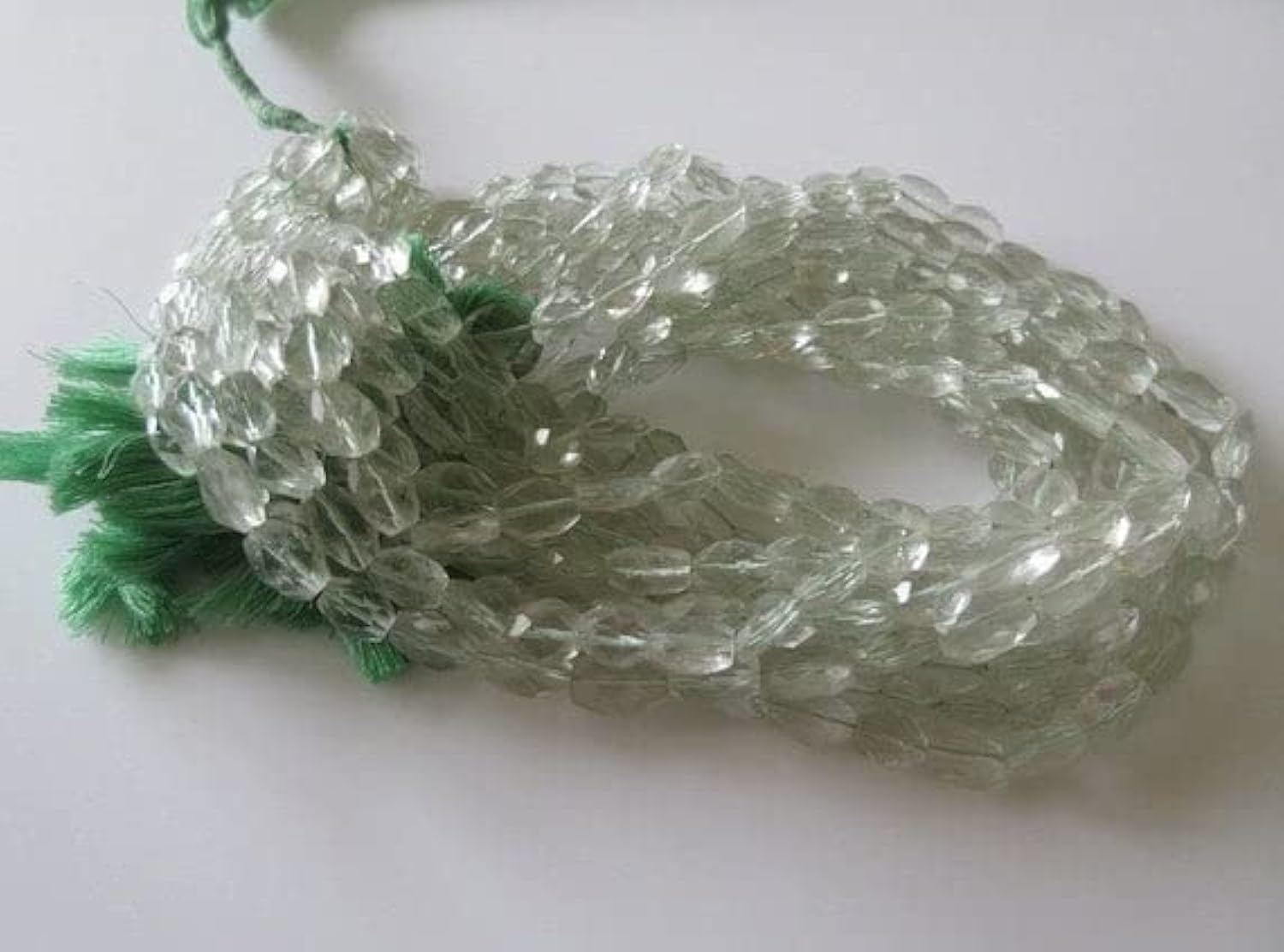 Perles d'Améthyste Verte facettées ovales 10mm pour création de bijoux uniques en pierres naturelles