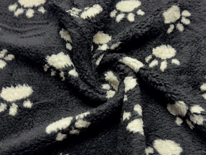 Tissu polaire imitation mouton noir ultra chaud motif pattes crème 10m isolant