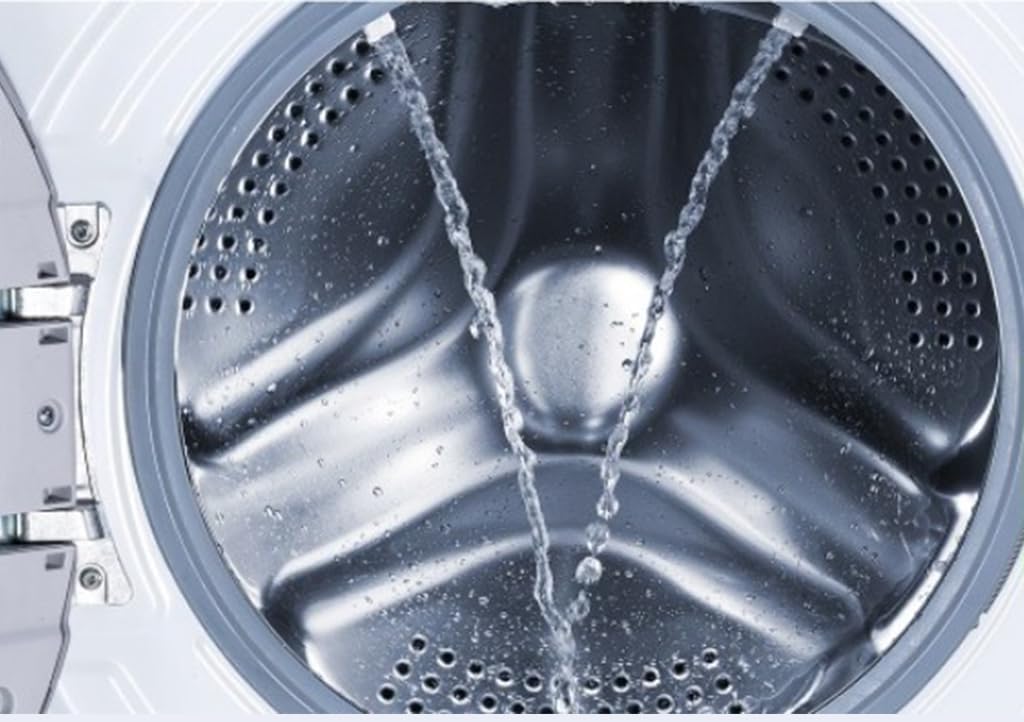 Interior of a washing machine drum with water jets