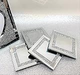 Espejo plateado con borde de cristal triturado incrustado