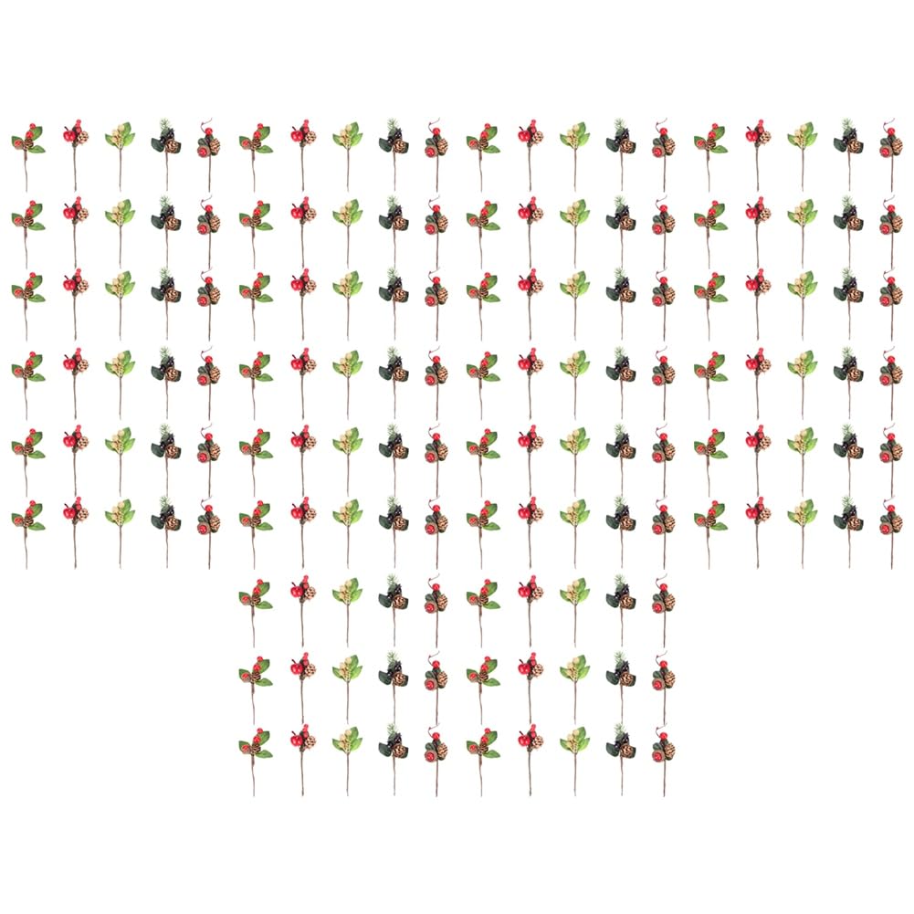 Pièces rouges de Noël et cônes de pin avec branches de houx haut de gamme