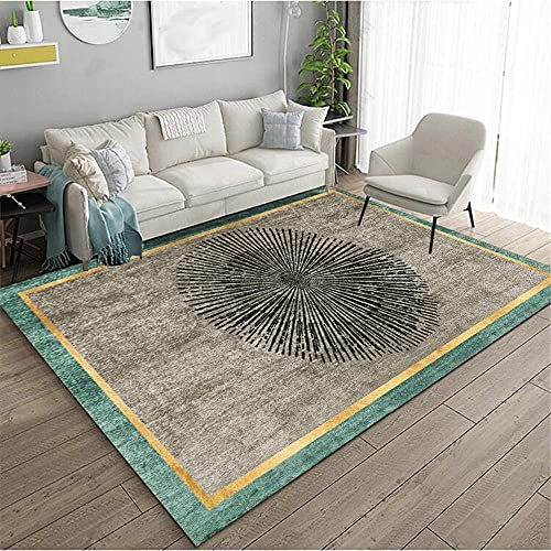 Tapis princesse abstrait or et bleu aux finitions graphiques