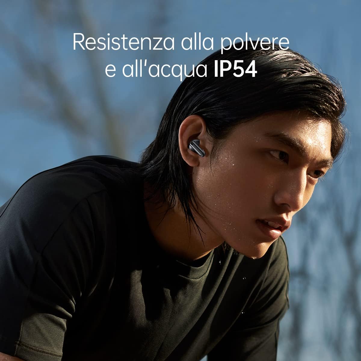 Person wearing OPPO Enco X2 earbuds during light activity, highlighting IP54 dust and water resistance