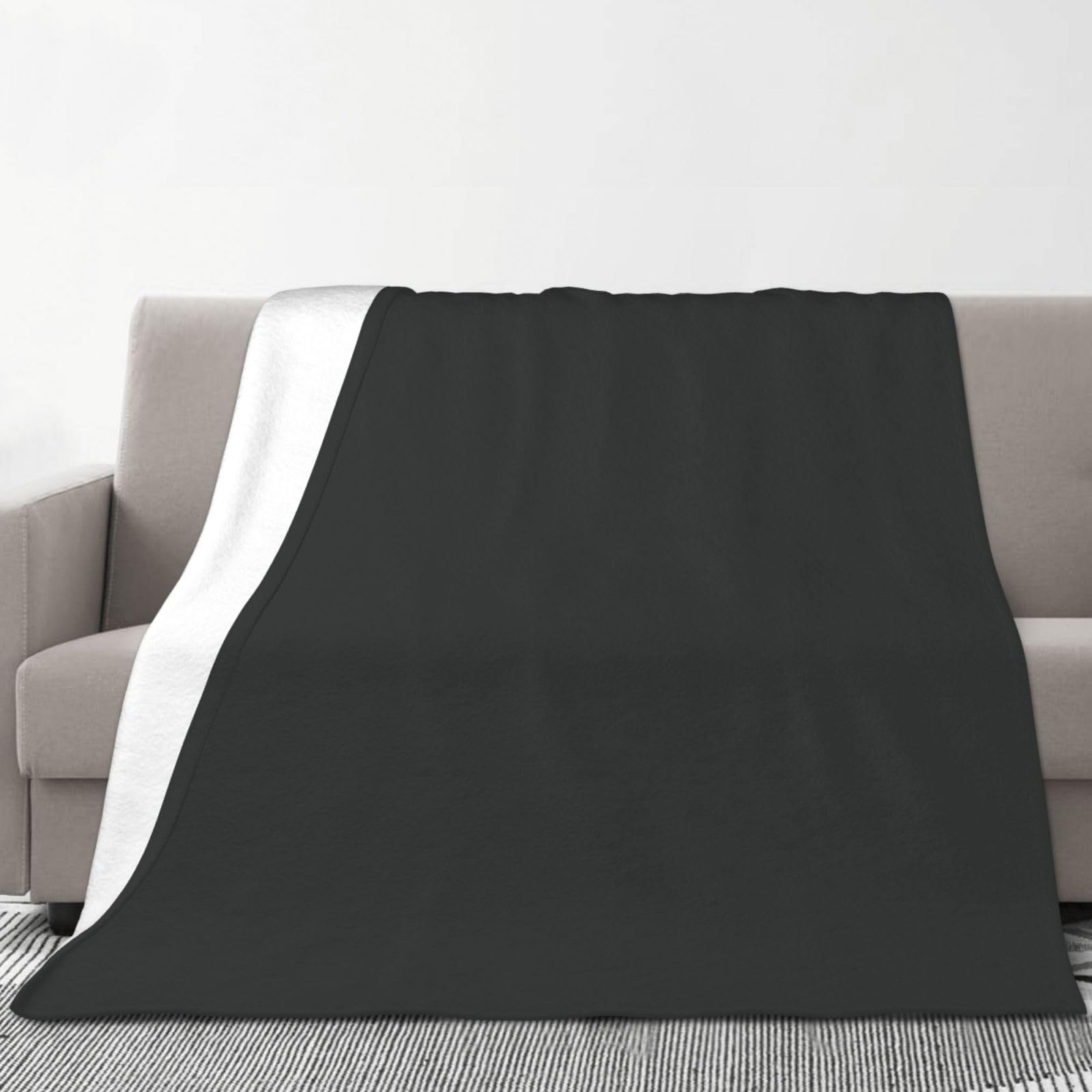 Couverture canapé anthracite contre le froid : flanelle légère 177cm
