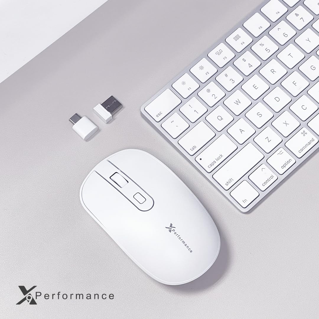 X9 Performance Wireless Mouse with USB-A and USB-C dongles next to a keyboard