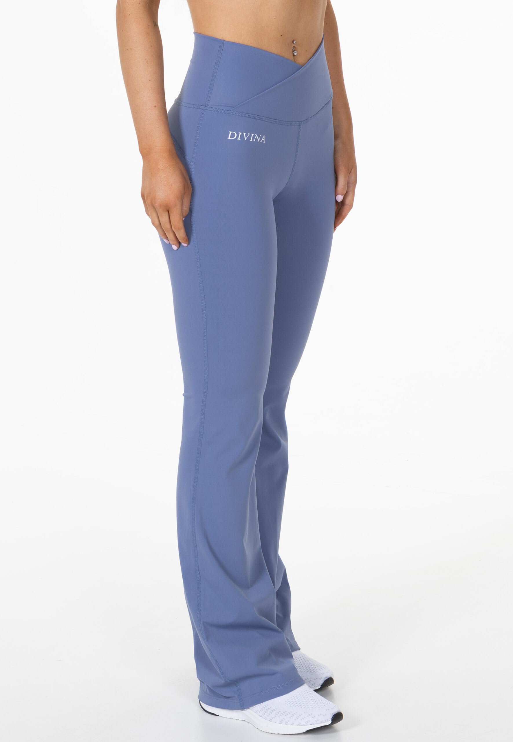 Divina Flare Tights, legginsy z rozkloszowanymi nogawkami i paskiem cross-over, idealne do treningu, jogi, spacerów i codziennego noszenia. Niebieskie M