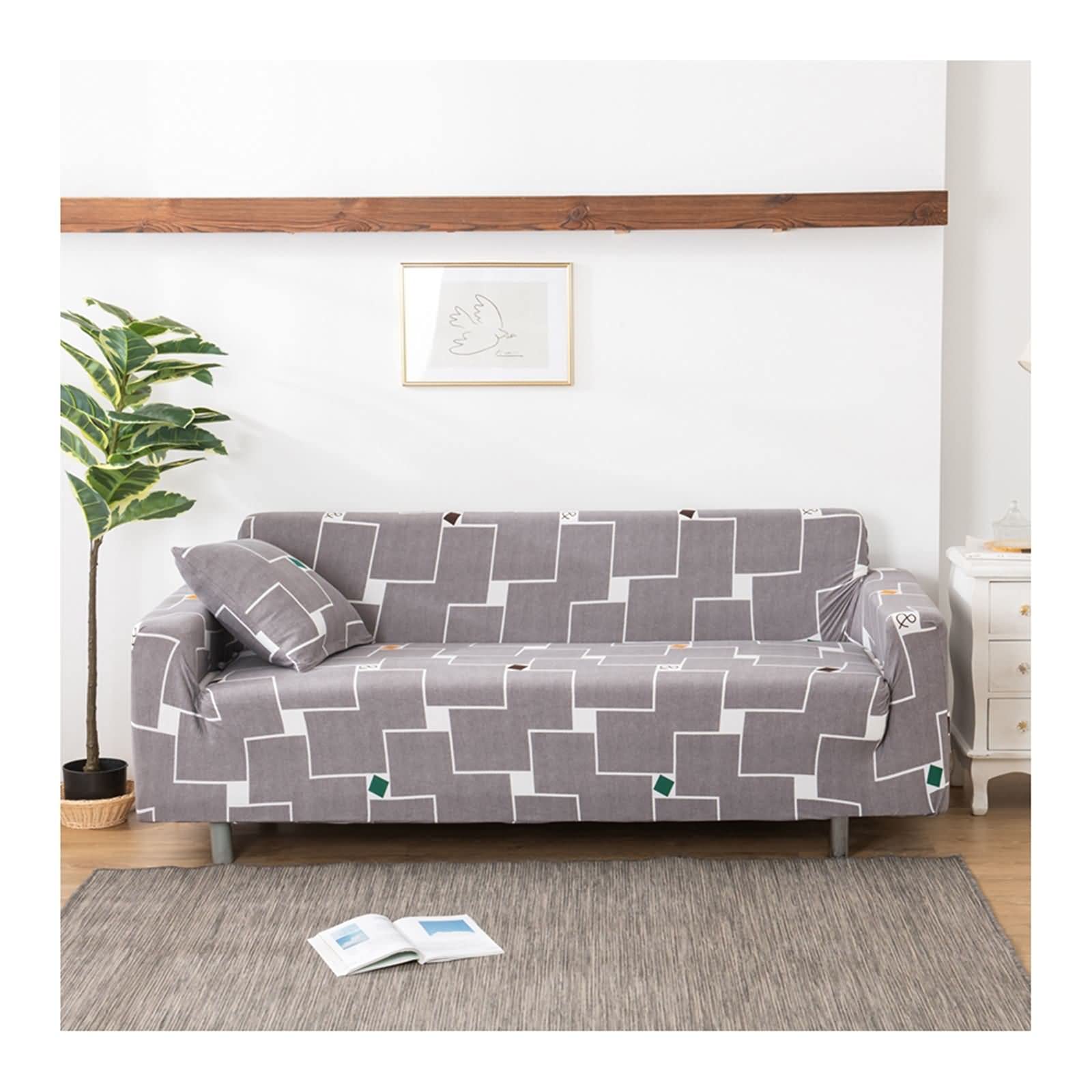 Housse de sofa 4 places extensible pour protéger un grand canapé usé