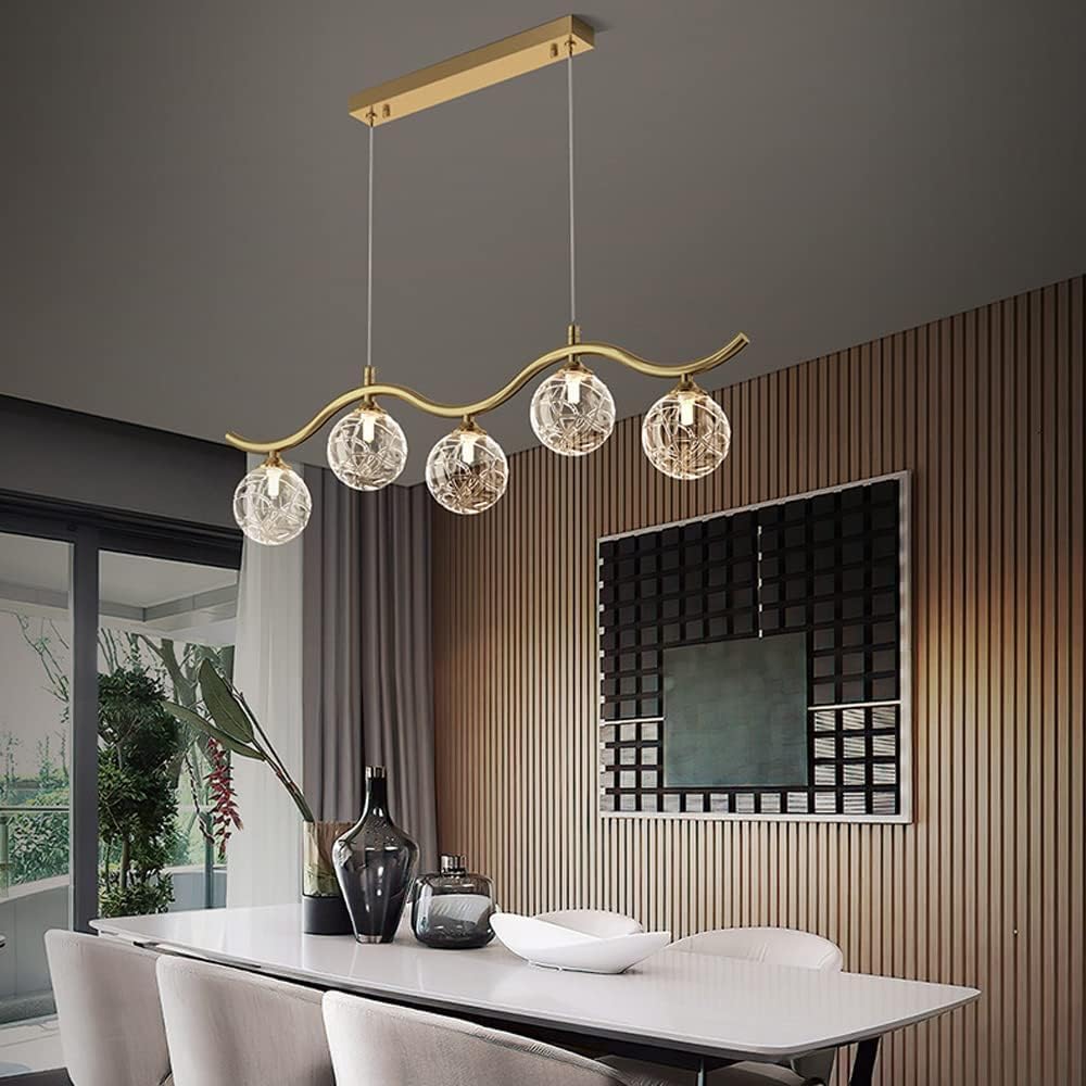 Lustre de luxe lumineux pour restaurant afin de sublimer les tables longues avec style