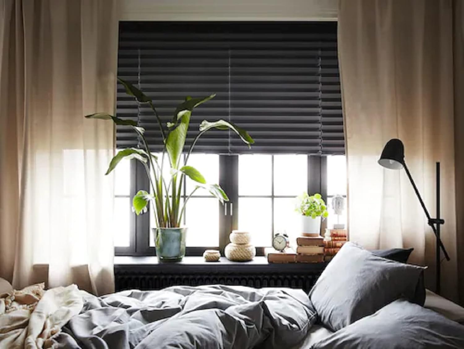 Ikea SCHOTTIS Block-Out Pleated Blind installed in a bedroom, demonstrating light block-out