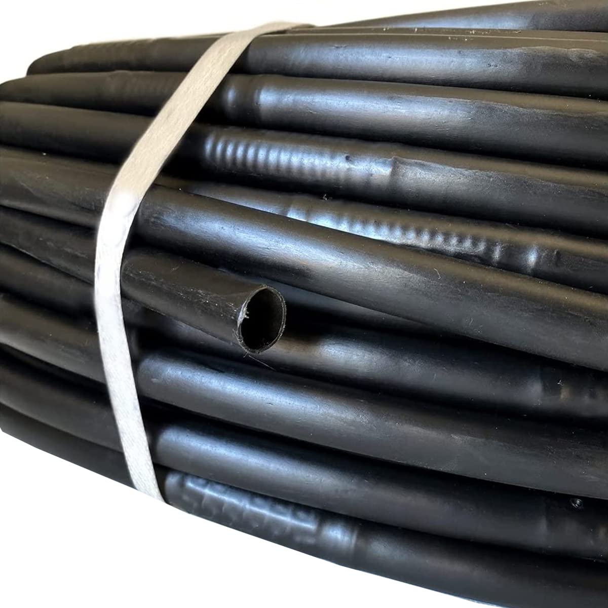 Tubería de goteo 16mm - CERTIFICADO AENOR - Goteros cada 33cm. Bobina de 100 METROS. Color NEGRO. Espesor pared 1,2mm. Uso Agrícola. Tubería fabricado en Polietileno
