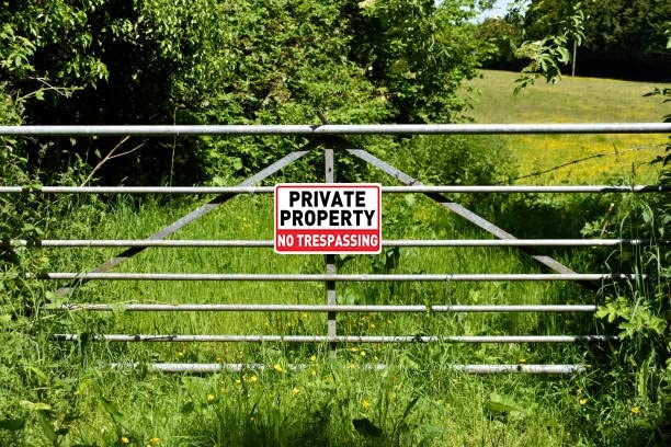 Bilingual Private Property No Trespassing Violators Prosecuted Sign - 24x18