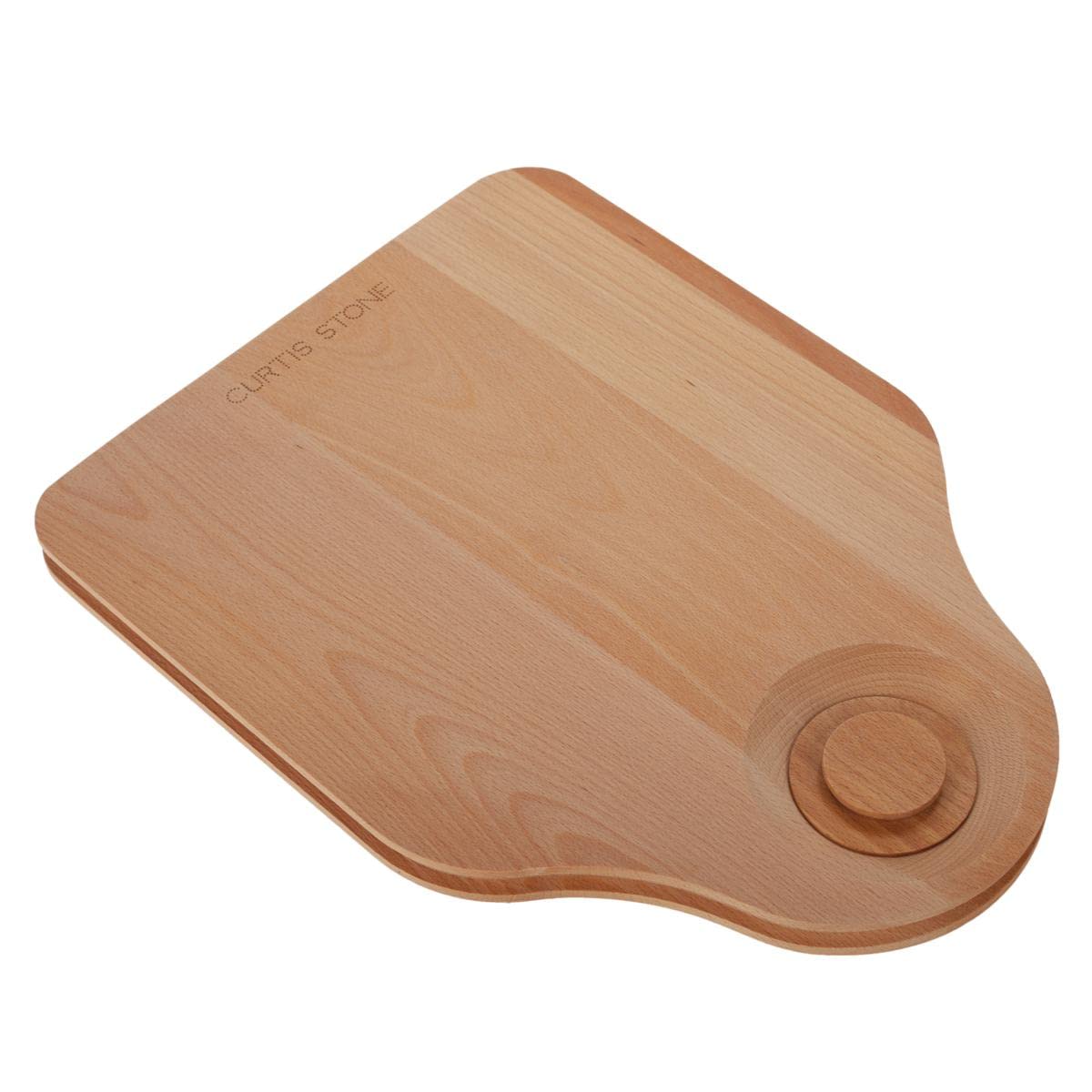 Close-up of the cutting board's chute with the wooden plug removed, showing the opening.