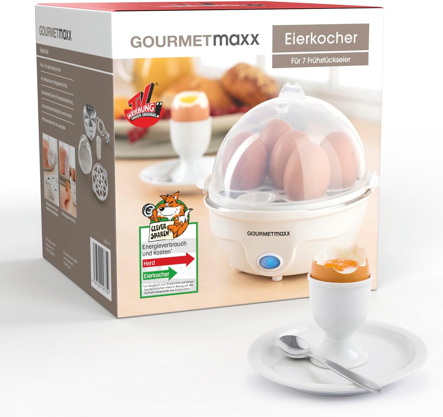 Disassembled GOURMETmaxx Egg Cooker showing base, egg tray, lid, and measuring cup