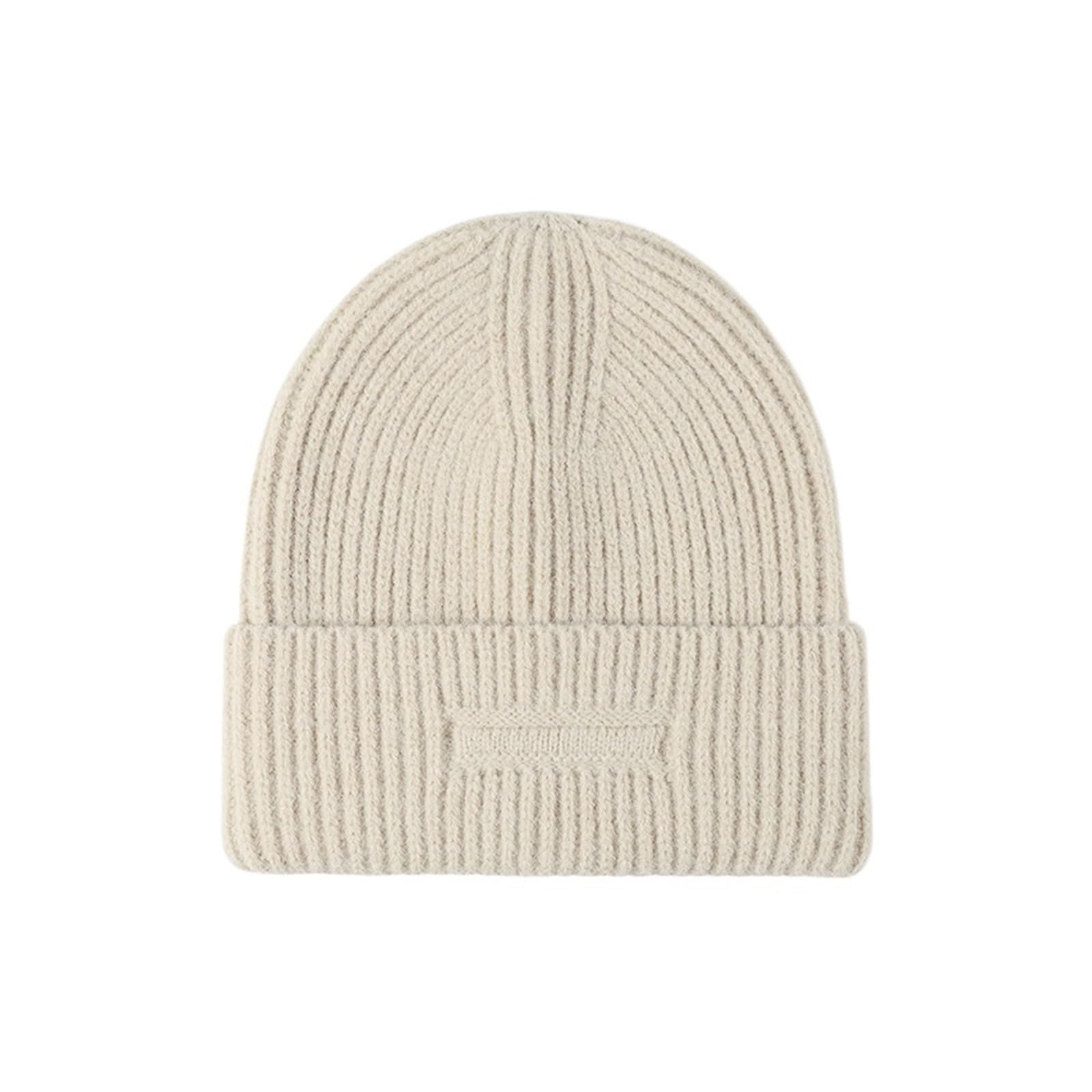 Bonnet tricoté en couleurs unies beige pour un style sobre et chaud