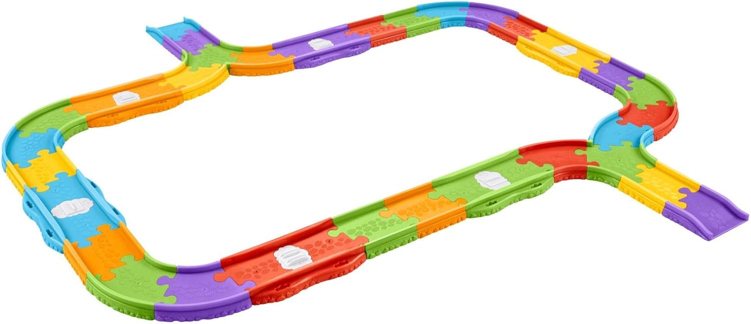 Image showing a child playing with a Thomas train on an assembled track, highlighting the interactive nature.