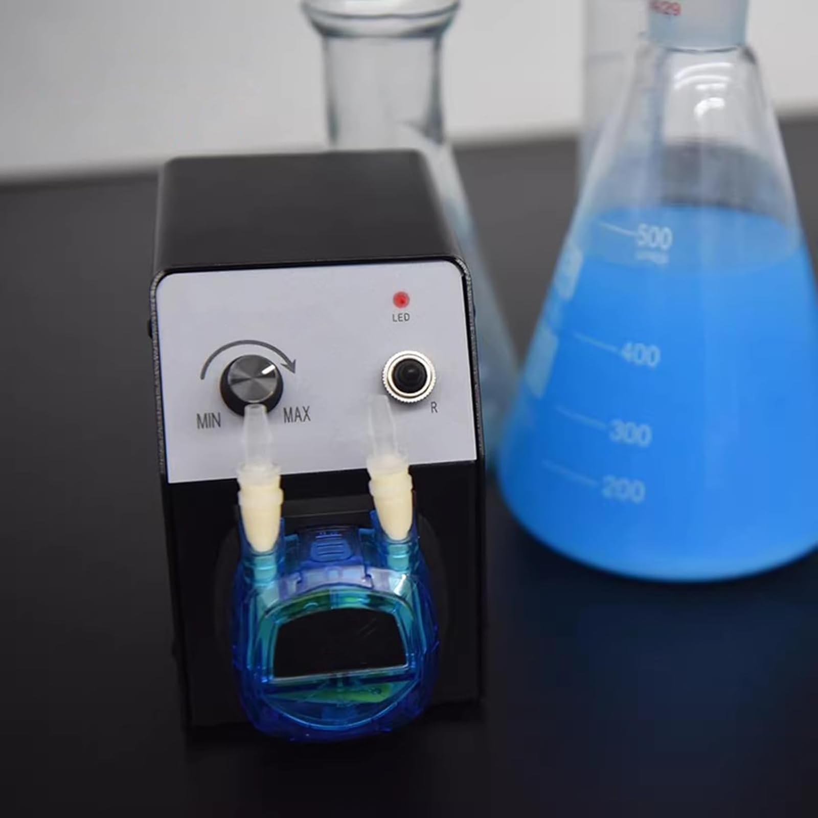 Bomba dosificadora peristáltica, bomba dosificadora de líquidos de velocidad ajustable, adecuada para ensayos químicos de laboratorio y transferencia de líquidos industriales.