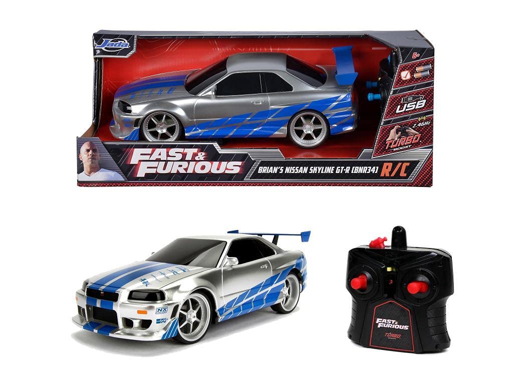 Jada Toys Fast & Furious RC samochód wyścigowy, Nissan Skyline GT-R, R34, samochód zdalnie sterowany, funkcja turbo, dwukanałowy, pilot radiowy, funkcja ładowania USB, baterie w zestawie, 1:16, 29 cm