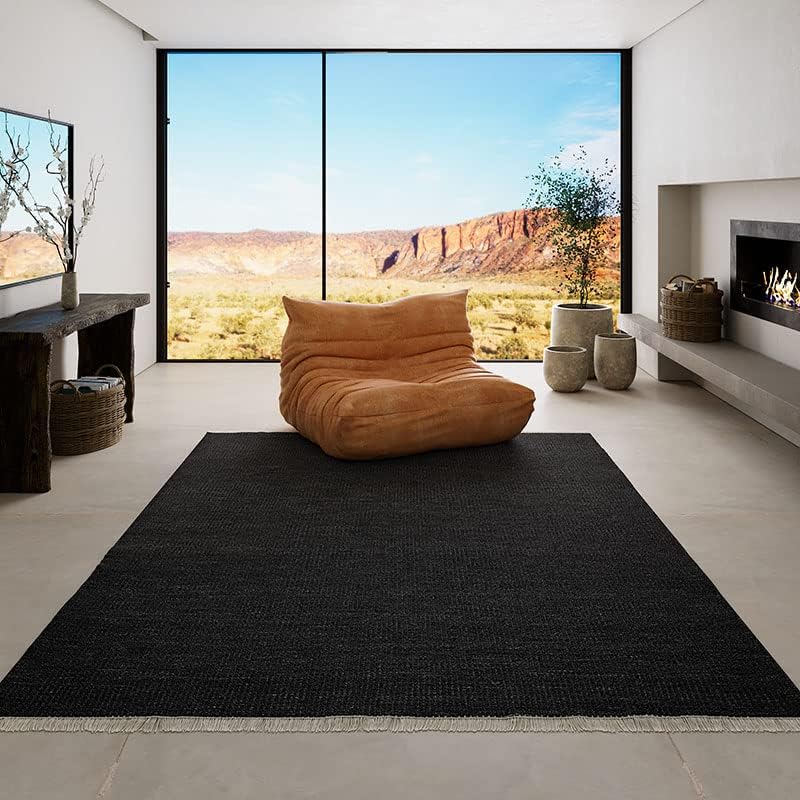 Handwoven Black Synthetic Indoor/Outdoor Rug with Fringe Detail - 5' x 8'