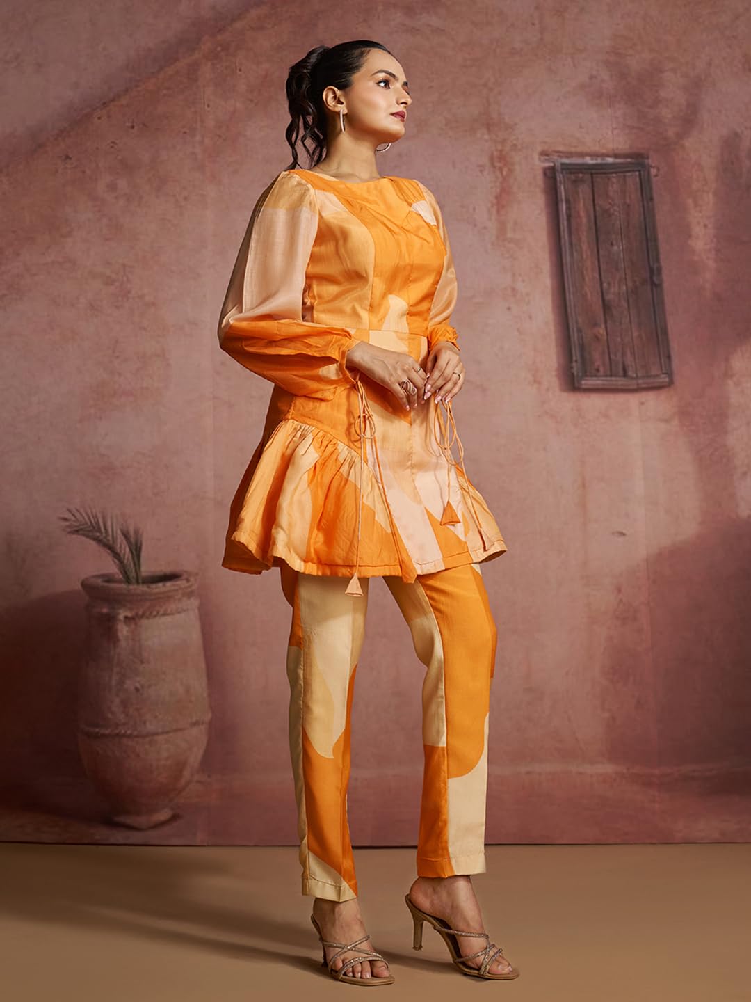 FUSIONIC Bold Abstract Orange Peplum Tunic Set with Balloon Sleeves and Straight Pants 1