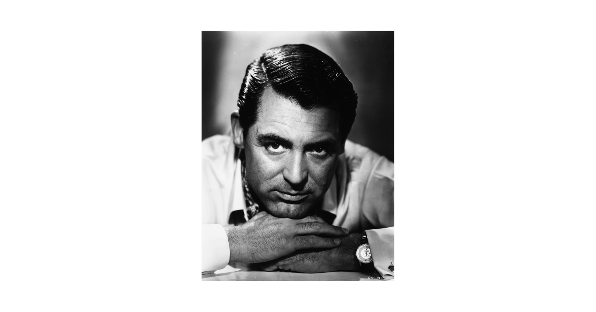 壁掛け写真　cary grant Amazon.com: Cary Grant Resting Head On Hands Photo Print (24