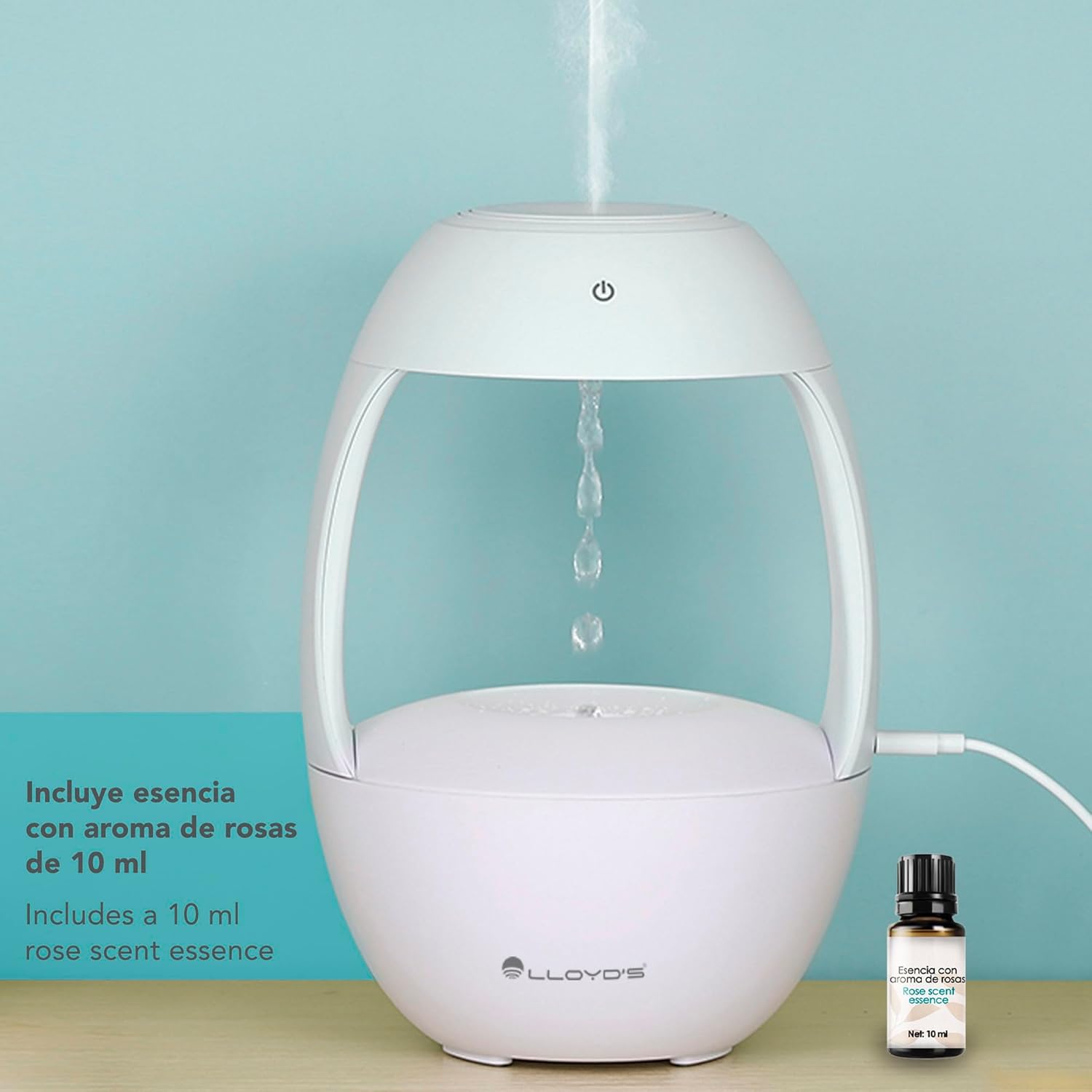 Diffuser showing anti-gravity water drip effect and included rose essence bottle