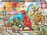 Puzzle de Dinosaurios de 100 piezas. Puzzle en el que se representa varios tipos de dinosaurios que pudieron poblar la tierra hace millones de años. Las piezas son de cartón y están perfectamente acabadas para que sea sencilla y segura su manipulación.