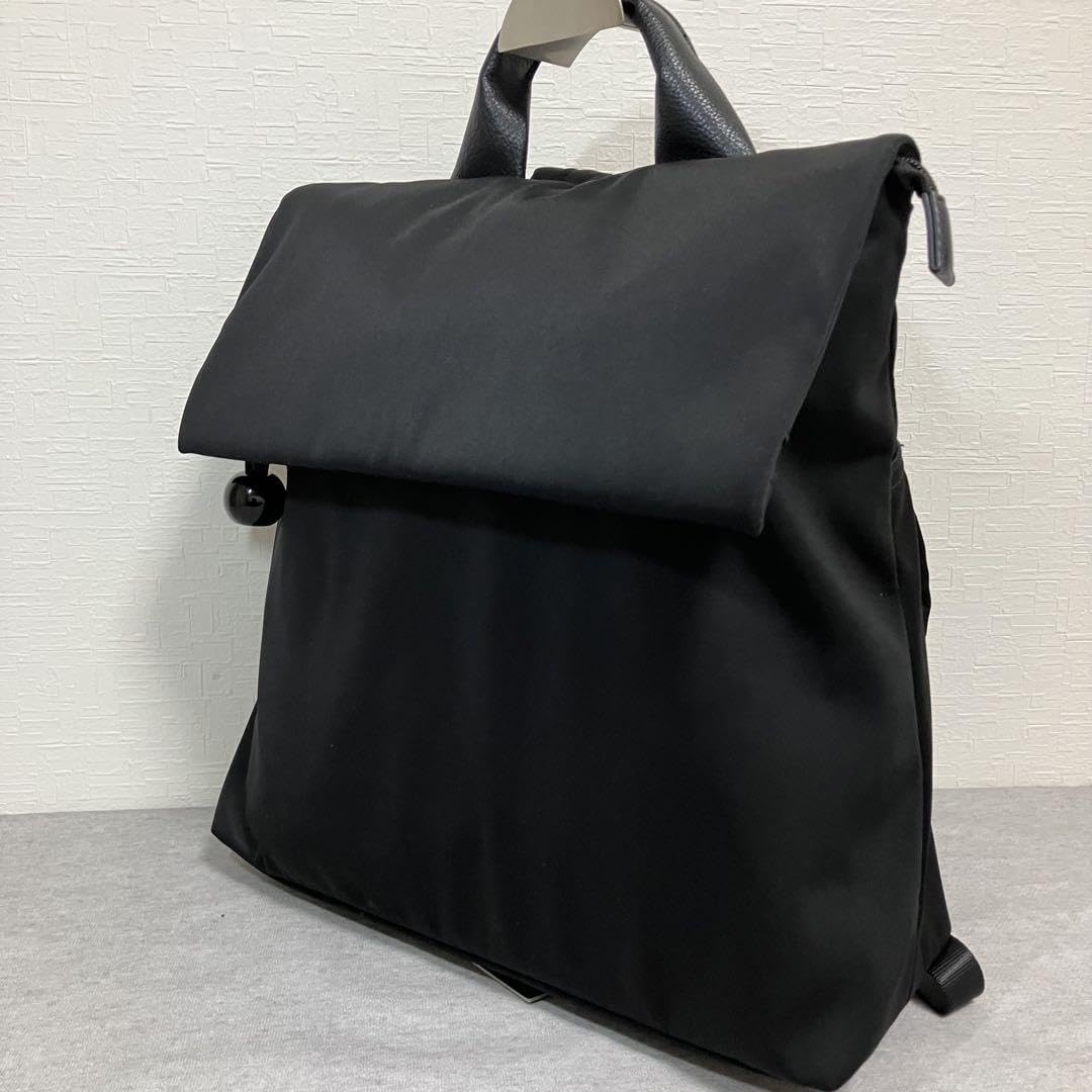 【美品】イアパピヨネ　ボールフラップリュック　撥水 Amazon.co.jp: イアパピヨネ ボールフラップ リュック 撥水
