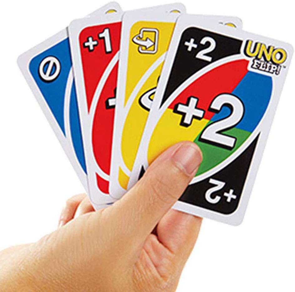 Hand holding various UNO Flip light side cards
