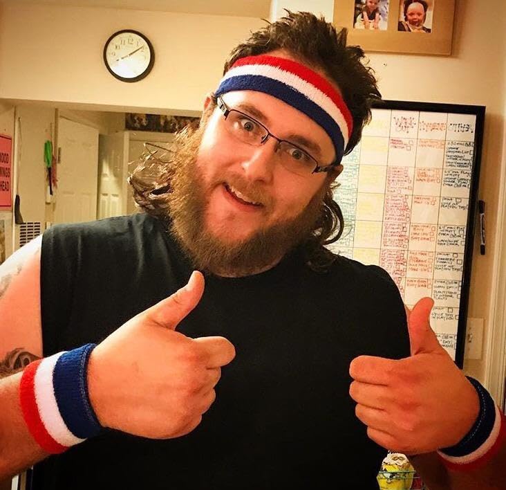 Image of Red White Blue Stripe Headband Mullet Wig for Men, USA Patriotic Retro Curly Mullet Wig, 4th of July Halloween Costume Party Wig (Medium Brown)
