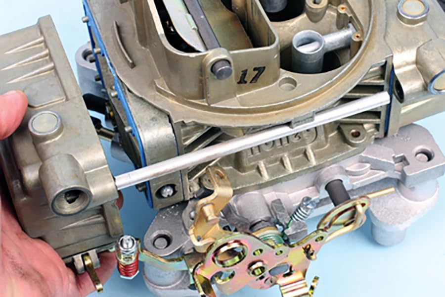 Assembling the main body of a Holley carburetor with fuel bowls