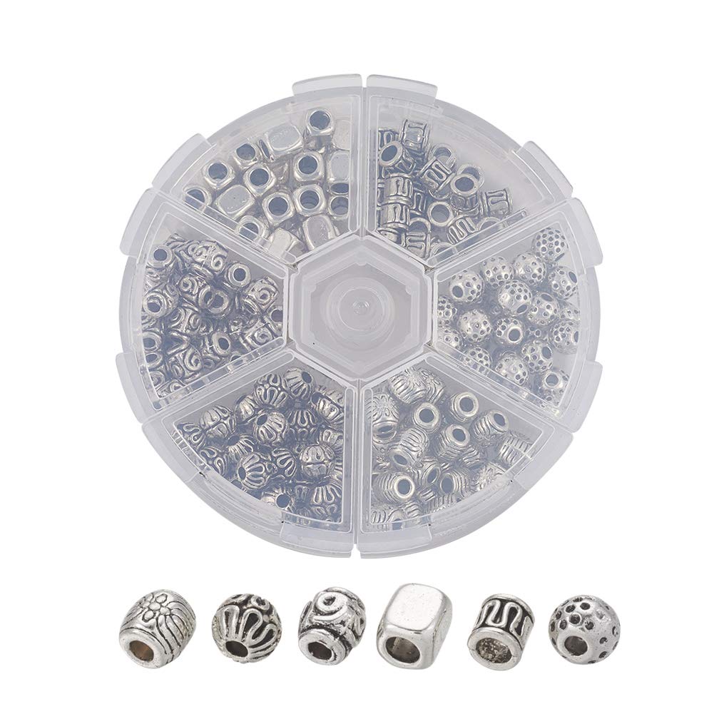 Distanziatore In Stile Tibetano Decorato Biconico Color Argento Diametro 0 9 Cm 10 Pz