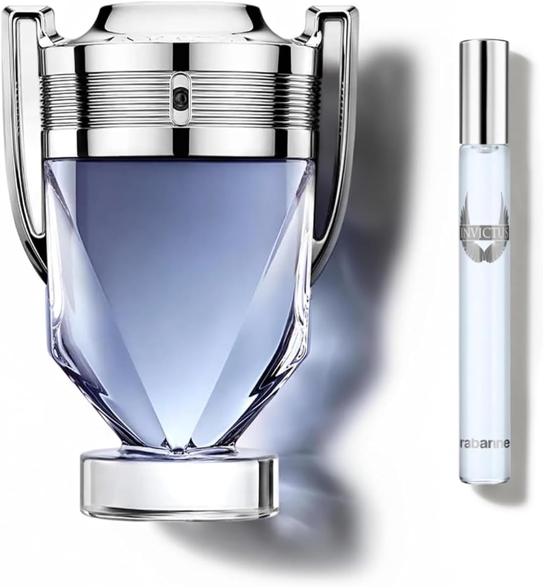 Invictus Eau de Toilette, 1.7 oz + Spray de viaje 0.34 oz, 2 piezas, colonia acuática amaderada, uso duradero, notas marinas y de pomelo, botella trofeo, tamaño completo y mini set de regalo para hombres