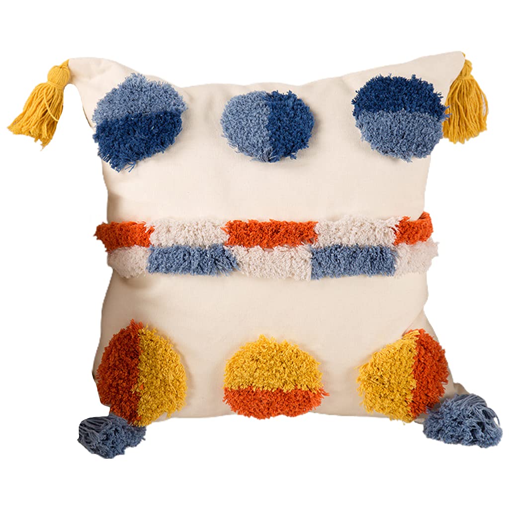 Housse de coussin touffetée et bohème pour créer un coin lecture cocooning sur votre lit