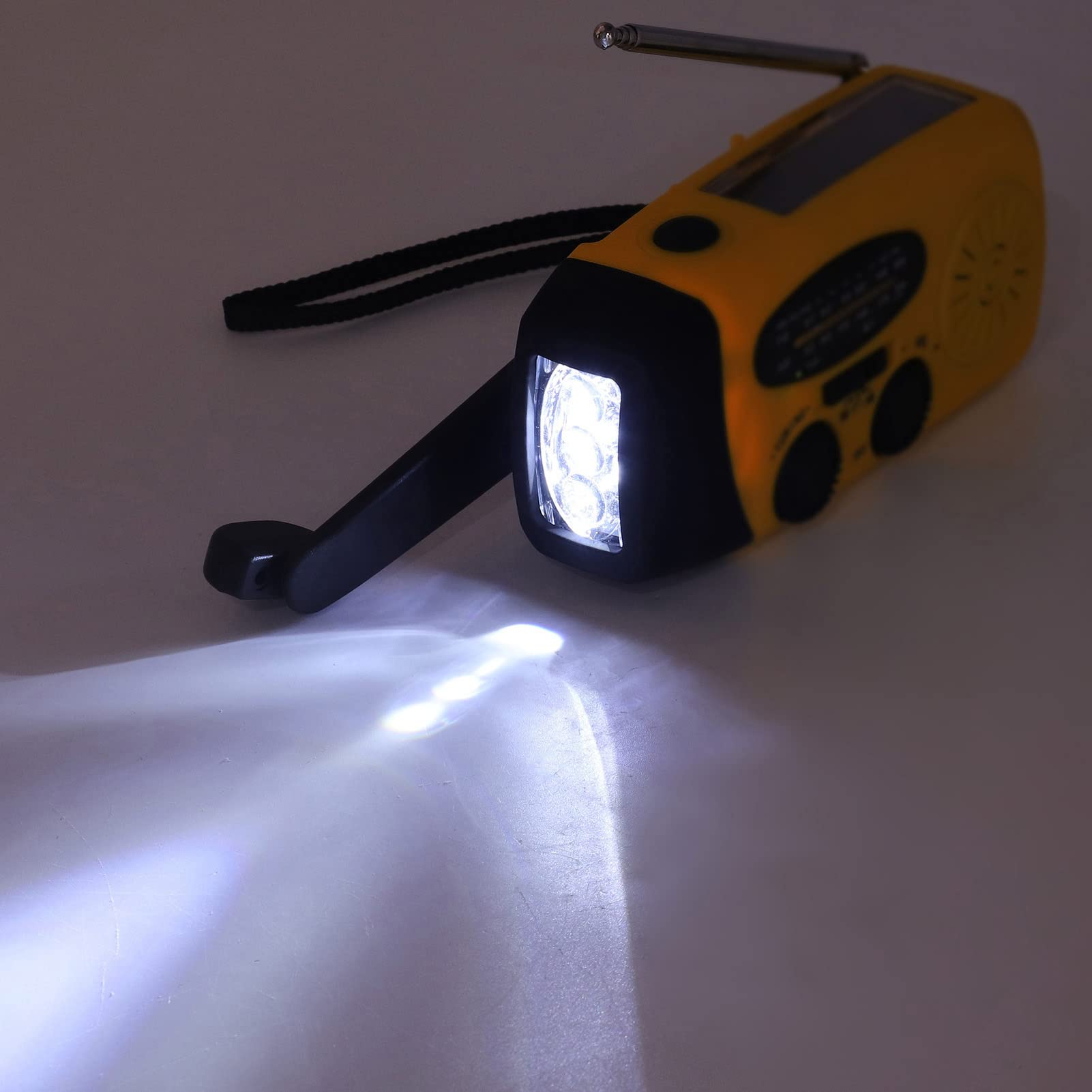 Radio Solaire Étanche IPX3 et Lanterne Multifonctionnelle à Manivelle avec Chargement USB Portable pour Le Camping (Modèle Européen)