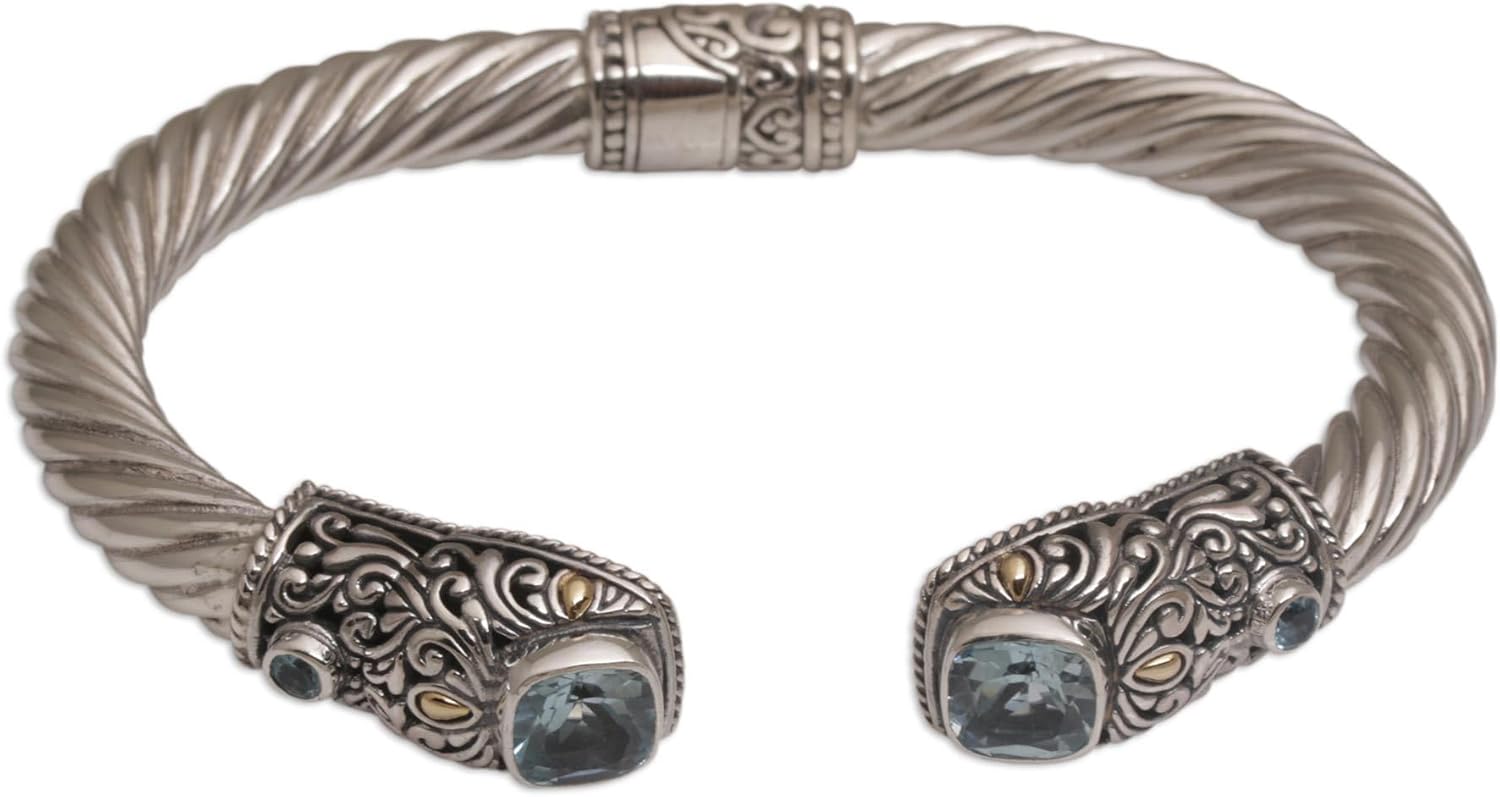 NOVICA Artisan Handmade Blue Topaz Gold Accent Cuff Bracelet Sterling Silver with Accents Tone Indonesia Gemstone Birthstone [6 in L (end to End) x 0.5 in W] ' Dazzling Crest'