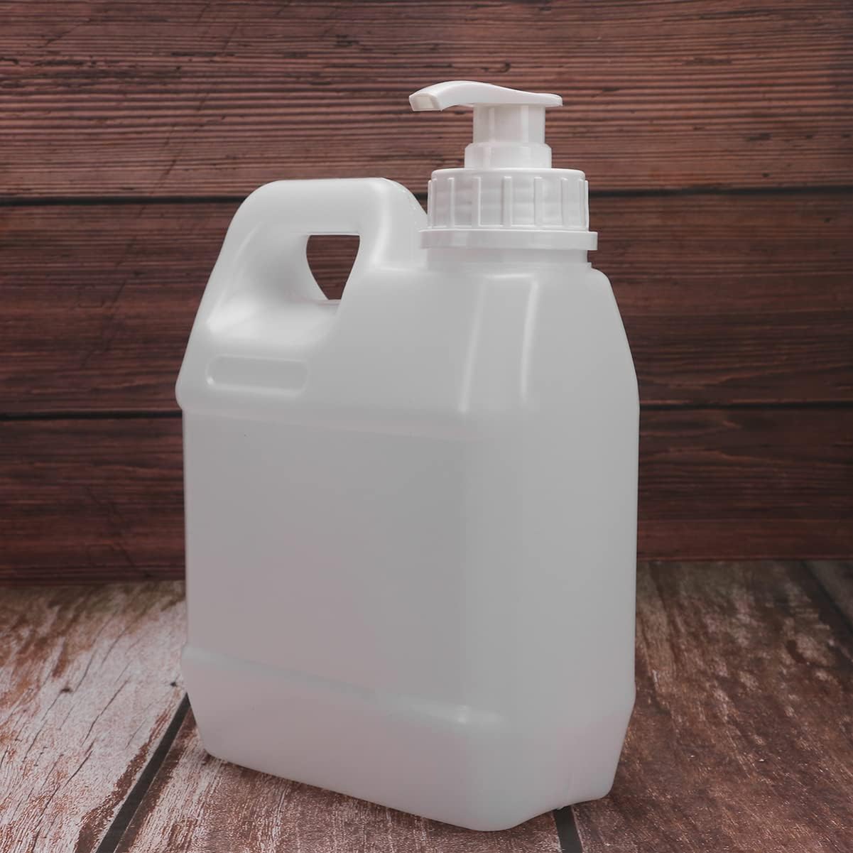 Cabilock Pump Dispenser Bottle 2 Pack Refillable Liquid Storage Container with Gasket and Anti-Theft Ring Mechanical Spring Press Large Opening for Cosmetics and Chemical Use