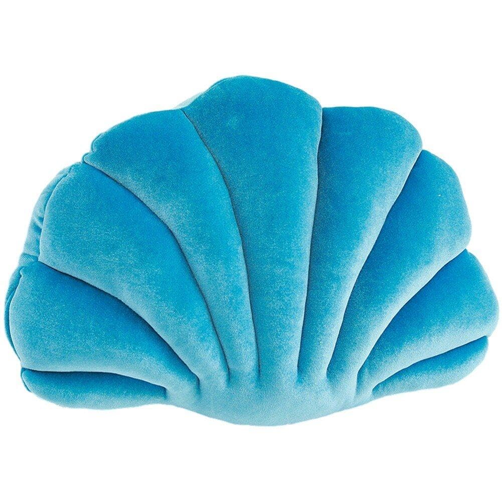 Coussins blancs en coquille pour chambre chic et grand hôtel