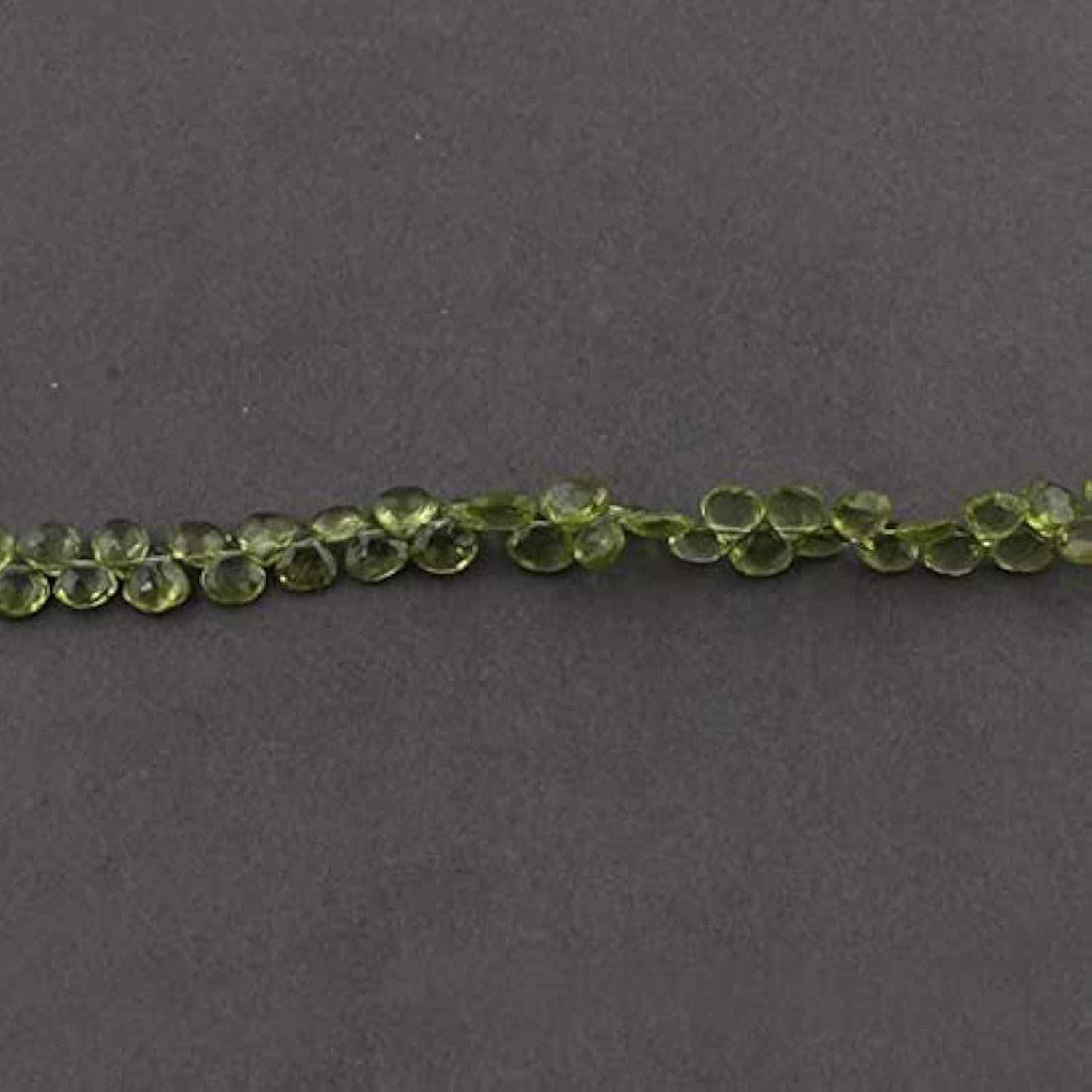 Peridot perles facettées en coeur pour créer vos bijoux d'été bohèmes