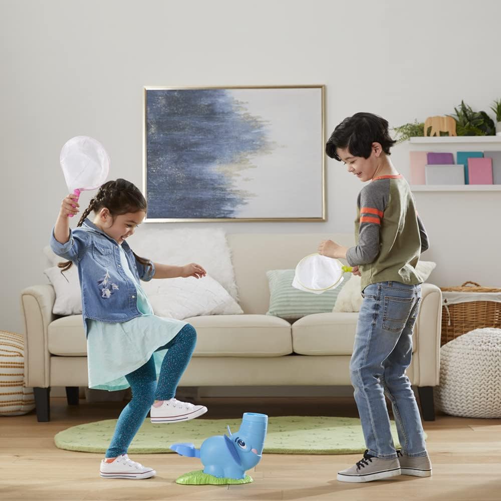 Two children playing Elefun Flyers, both holding nets and looking up to catch flying discs.