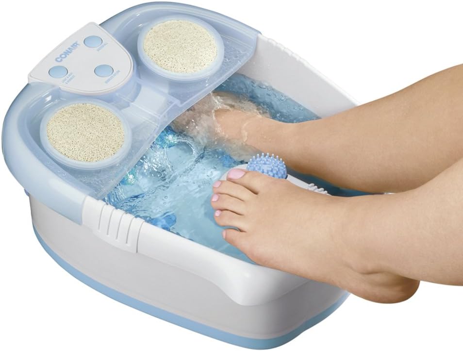 Person's feet inside the Conair Foot Spa with Waterfall