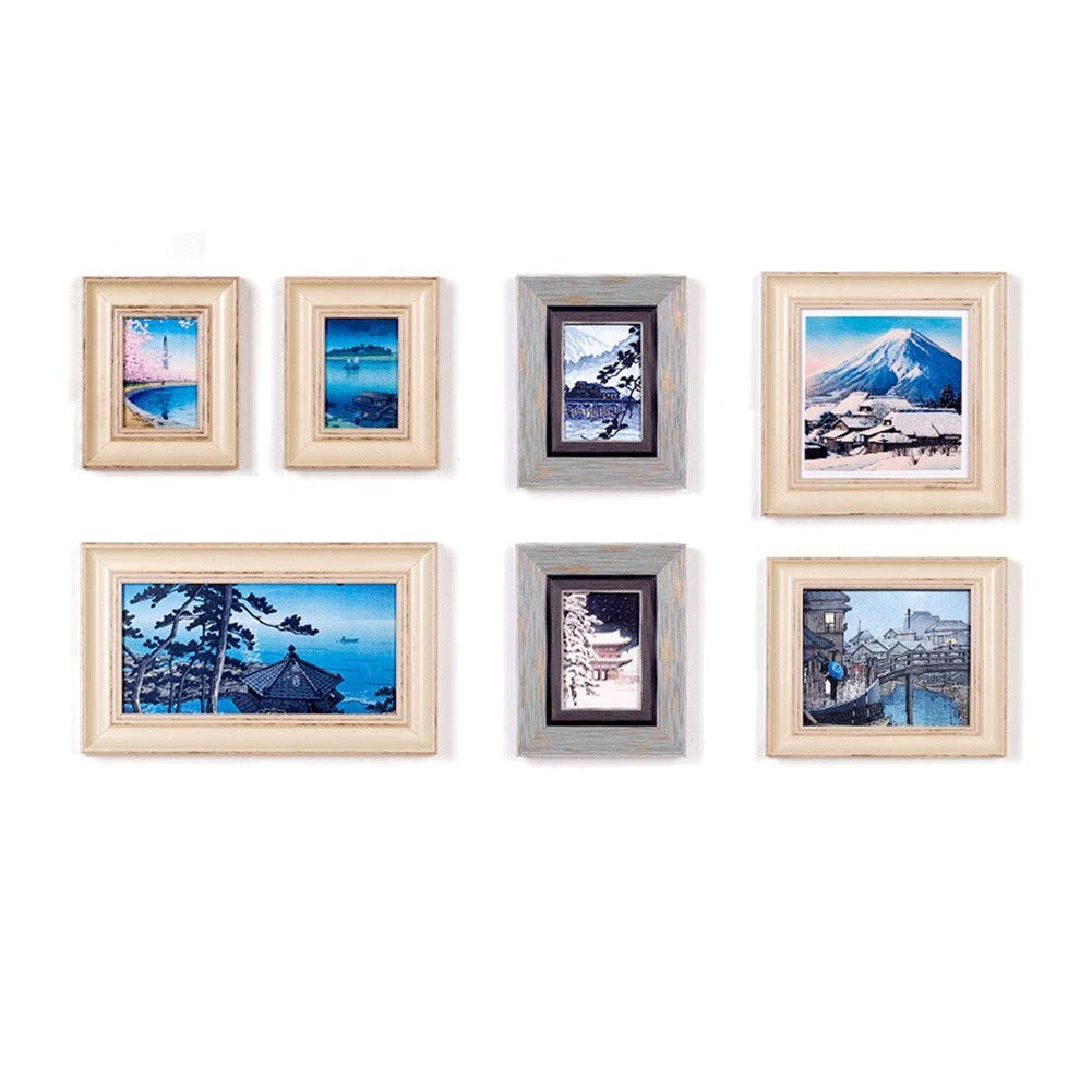 Décoration murale grand format pour habiller un mur vide avec 7 cadres photo