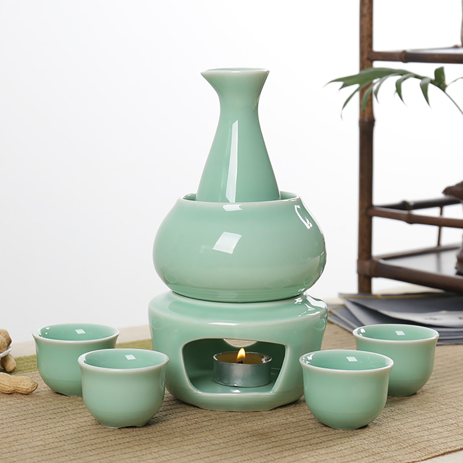 elegante japanische Sake Flaschen Set enthält eine Karaffe, einen Warmhalteofen, eine Schüssel und passende Tassen für traditionelles Trinken und den Heimgebrauch Sake Wärmer Set aus Keramik